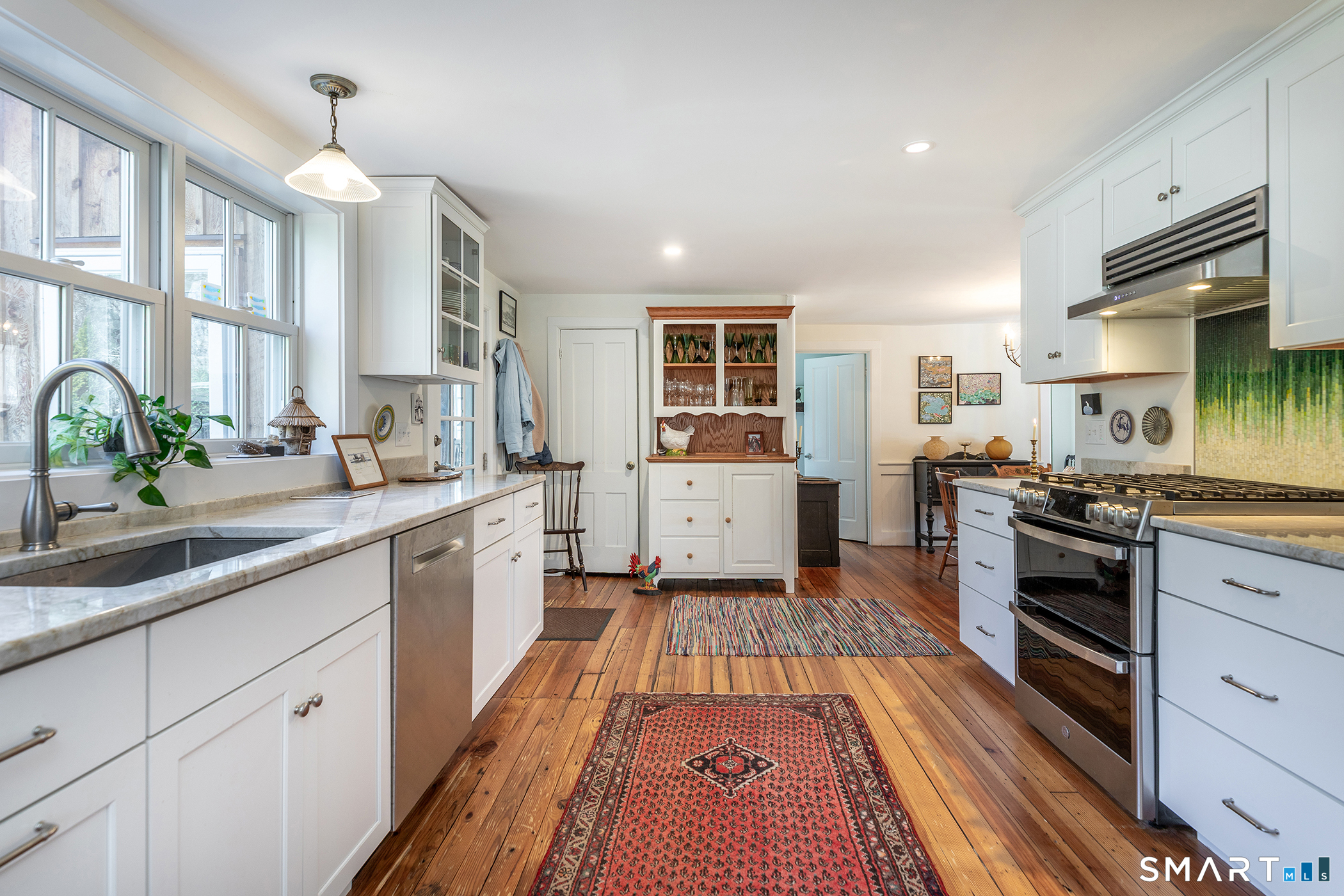 51 Mill Street Hartland, CT 06065 - Photo 4 of 36 a large kitchen with stainless steel appliances granite countertop a lot of counter space and a sink