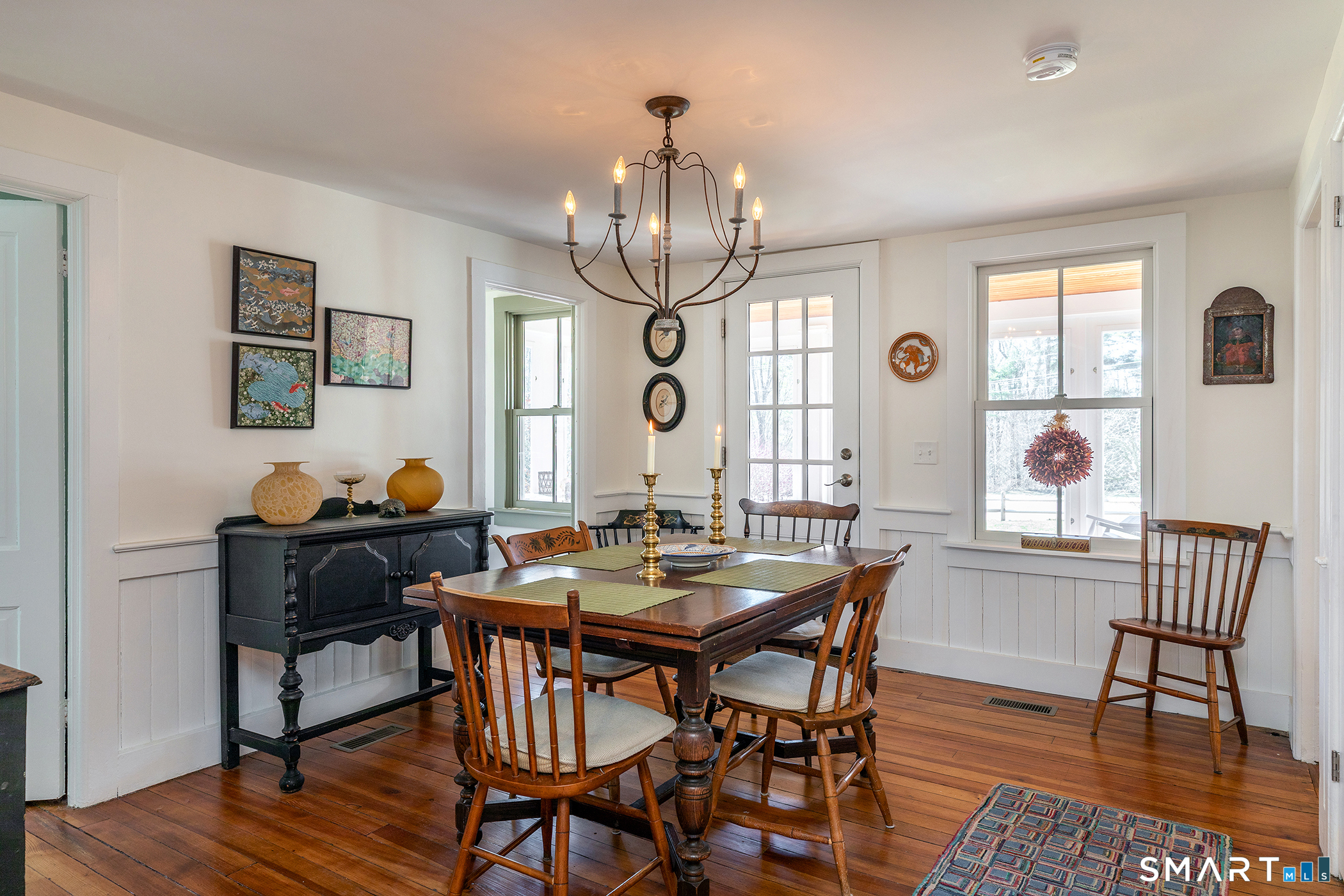 51 Mill Street Hartland, CT 06065 - Photo 7 of 36 a view of a dining room with furniture window and wooden floor