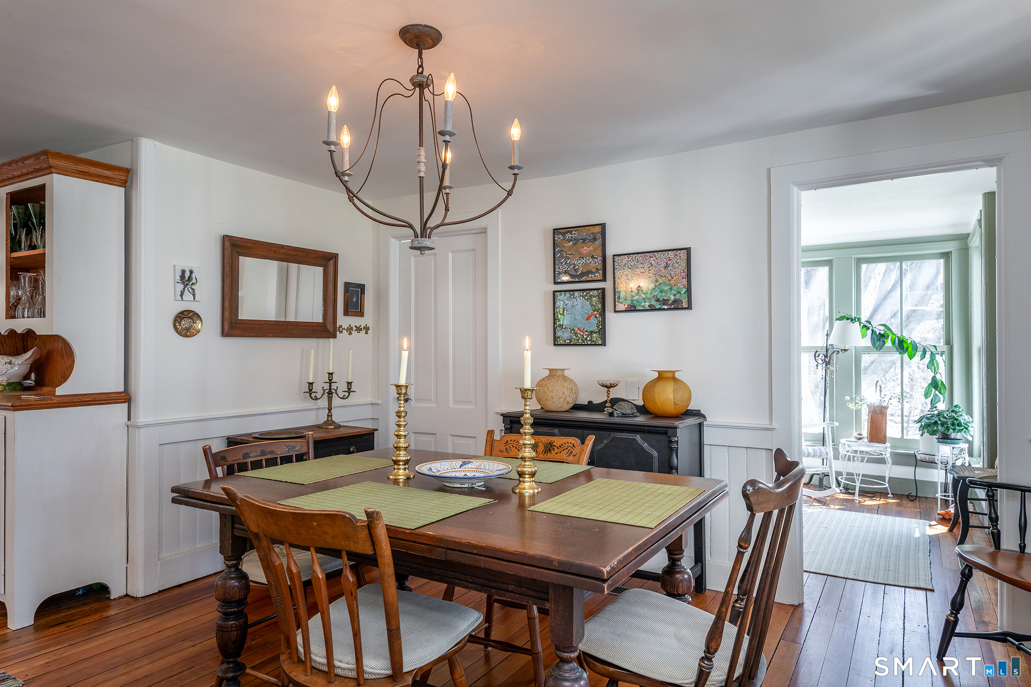51 Mill Street Hartland, CT 06065 - Photo 8 of 36 a view of a dining room with furniture window and wooden floor