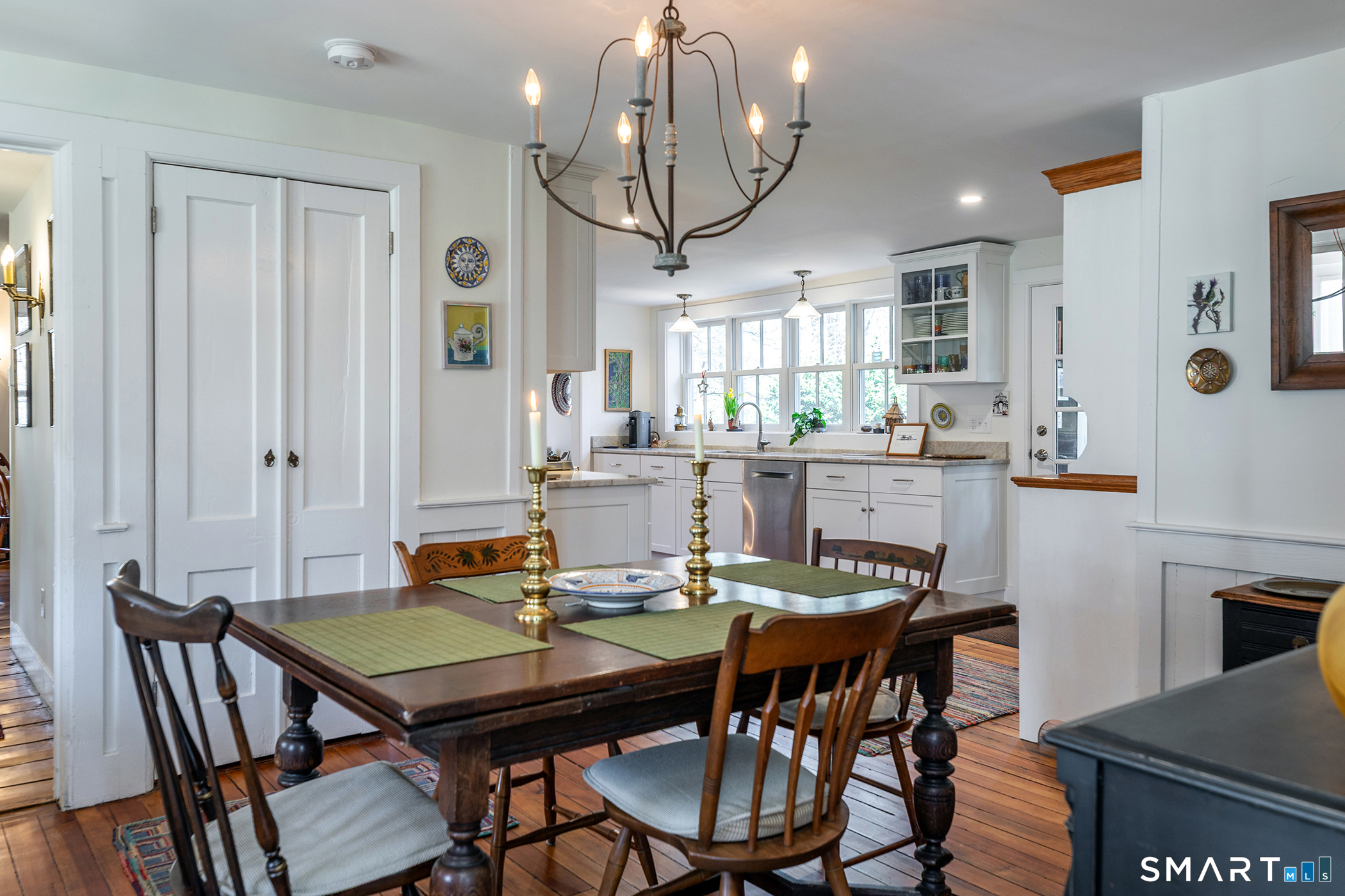51 Mill Street Hartland, CT 06065 - Photo 10 of 36 a view of a dining room with furniture window and wooden floor