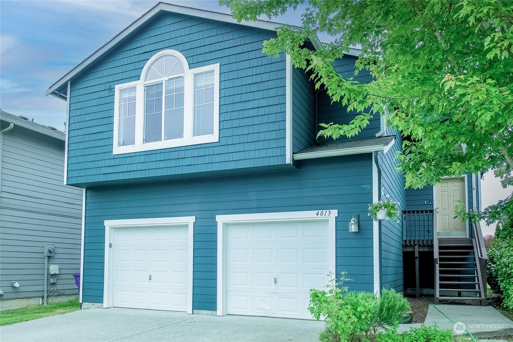 4013 152nd Place Southeast Bothell, WA 98012 - Photo 1 of 24 a view of a house with a garage