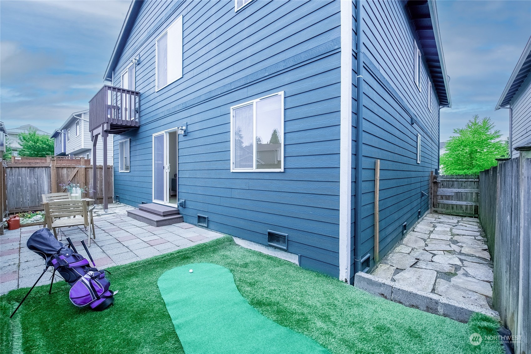 4013 152nd Place Southeast Bothell, WA 98012 - Photo 24 of 24 a view of backyard with table and chairs and potted plants