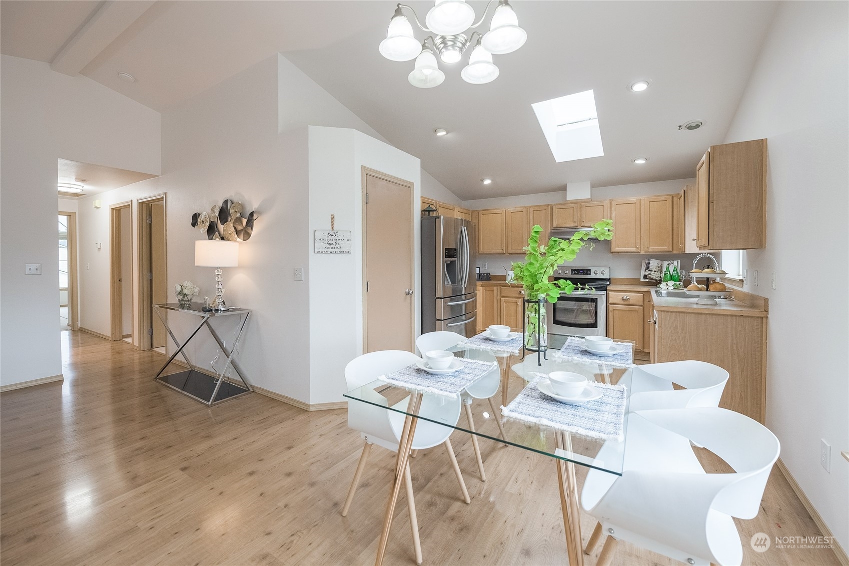 4013 152nd Place Southeast Bothell, WA 98012 - Photo 6 of 24 a view of a dining room with furniture and wooden floor