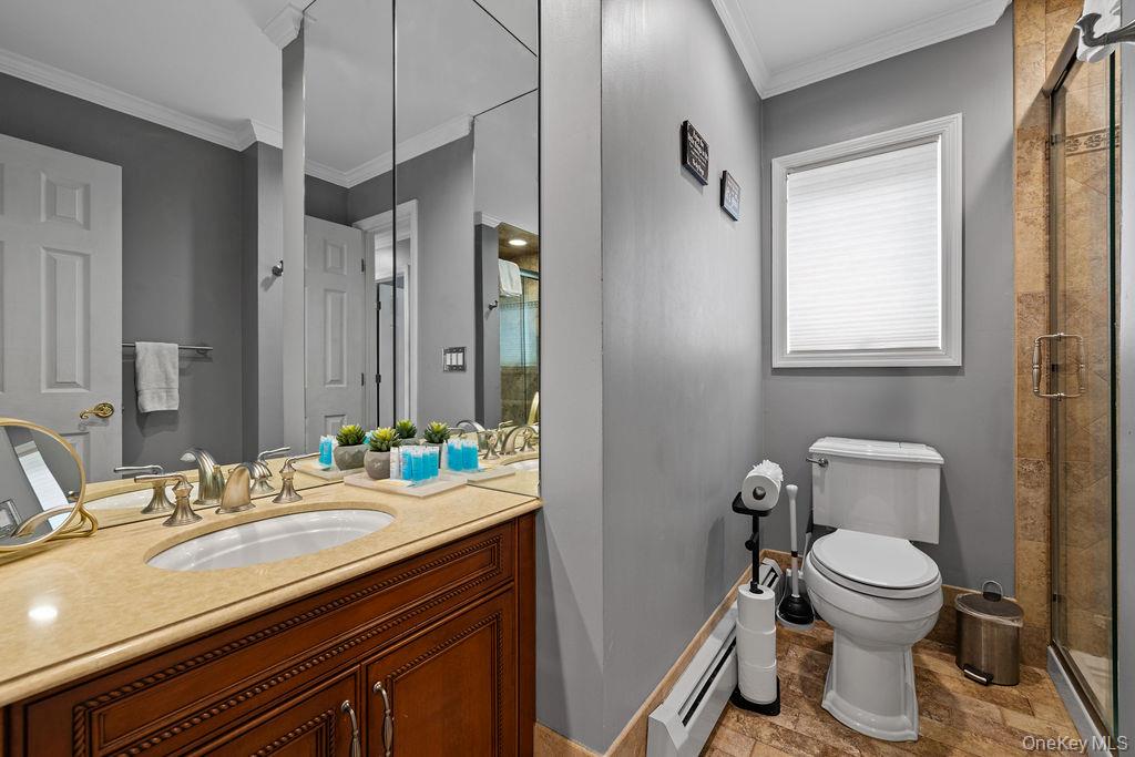 14 Blue Note Drive Stony Point, NY 10980 - Photo 18 of 48 a bathroom with a sink a toilet and a mirror