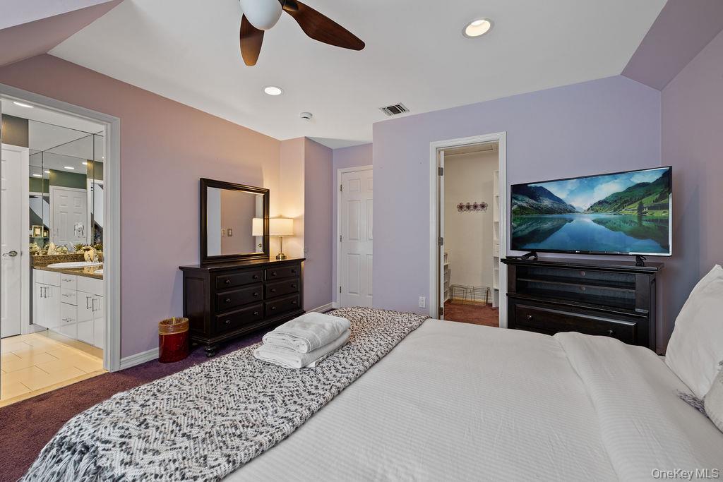 14 Blue Note Drive Stony Point, NY 10980 - Photo 23 of 48 a bedroom with a bed and a flat screen tv