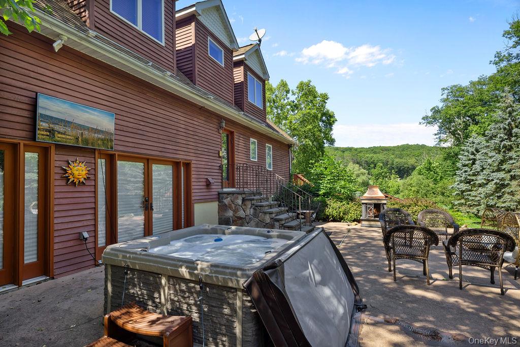 14 Blue Note Drive Stony Point, NY 10980 - Photo 43 of 48 a view of a patio with table and chairs and potted plants