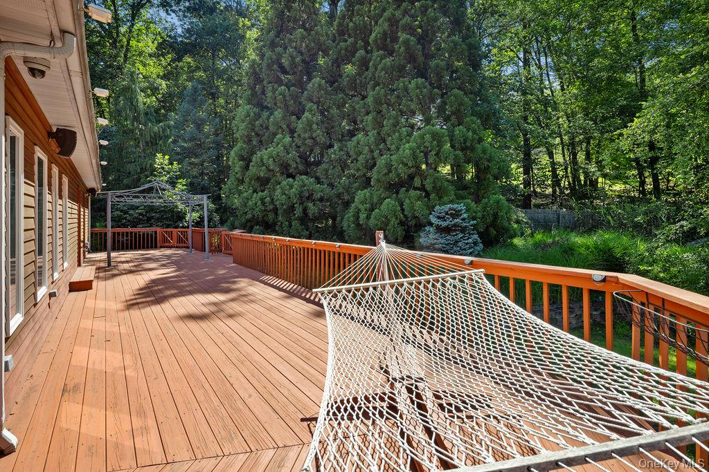 14 Blue Note Drive Stony Point, NY 10980 - Photo 45 of 48 a view of balcony with wooden floor and fence