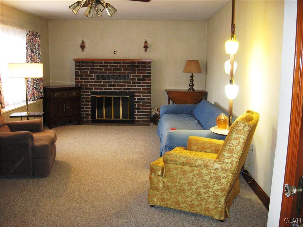 3744 Best Station Road Slatington, PA 18080 - Photo 2 of 20 a living room with furniture and a fireplace
