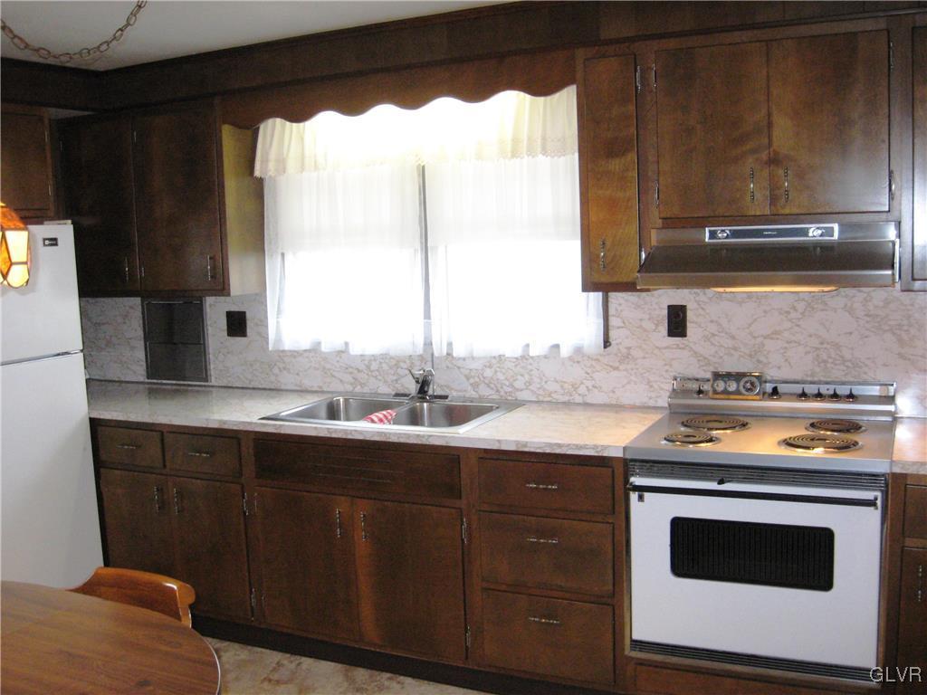 3744 Best Station Road Slatington, PA 18080 - Photo 4 of 20 a kitchen with a sink stove and microwave