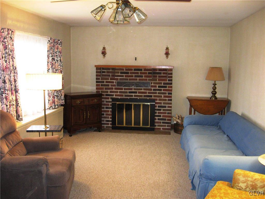 3744 Best Station Road Slatington, PA 18080 - Photo 6 of 20 a living room with furniture and a fireplace