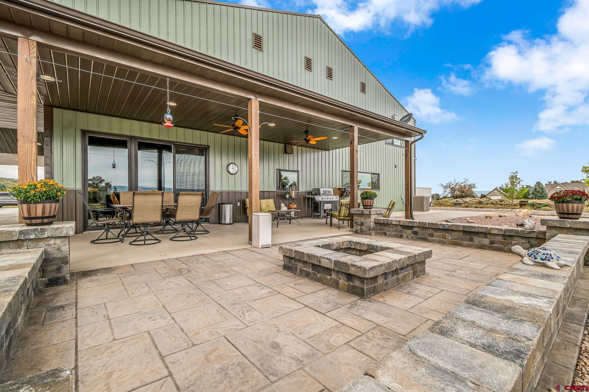 18236 6300th Road Montrose, CO 81403 - Photo 35 of 35 1,104 s/f of wrap around covered patio space to enjoy spectacular mountain views and sunrises.