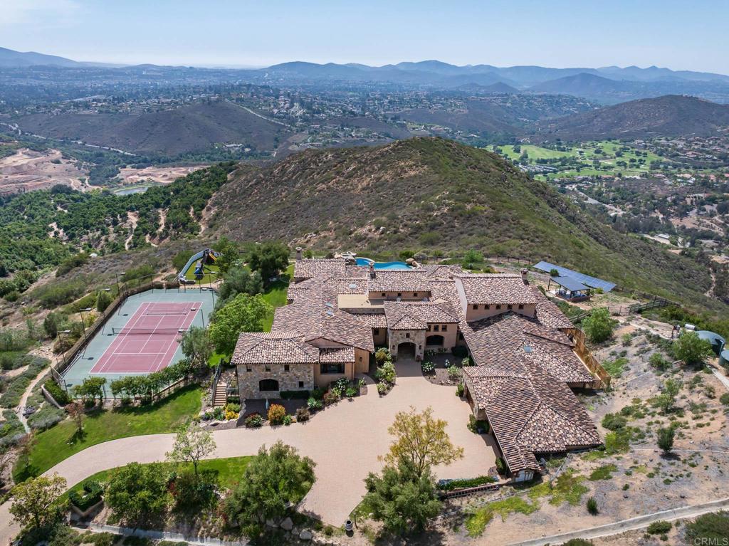 18000 Sunset Point Road Poway, CA 92064 - Photo 3 of 36 an aerial view of a house with mountain view