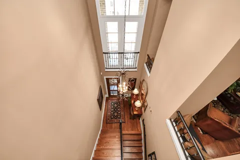a view of an entryway with wooden floor