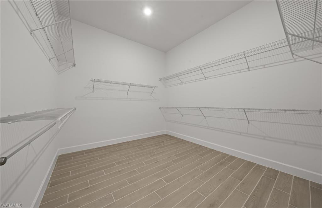 1992 Don Benito Way Naples, FL 34120 - Photo 19 of 49 Oversized owner's suite closet