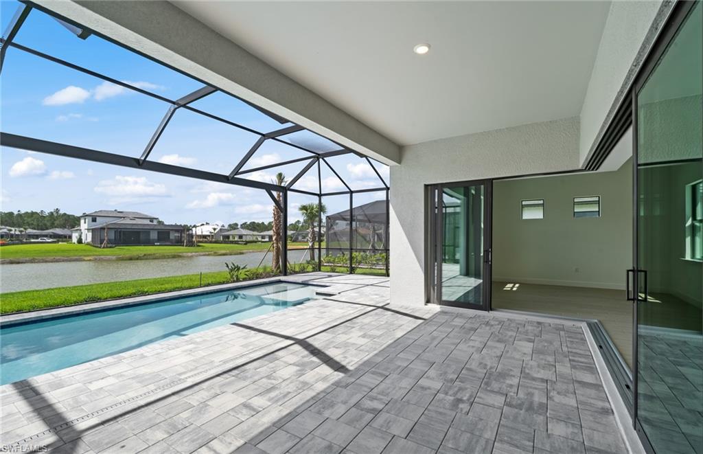 1992 Don Benito Way Naples, FL 34120 - Photo 28 of 49 Custom pool/spa with sunshelf
