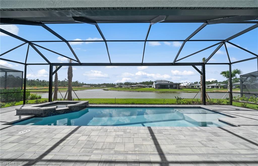 1992 Don Benito Way Naples, FL 34120 - Photo 3 of 49 Custom pool/spa with sunshelf