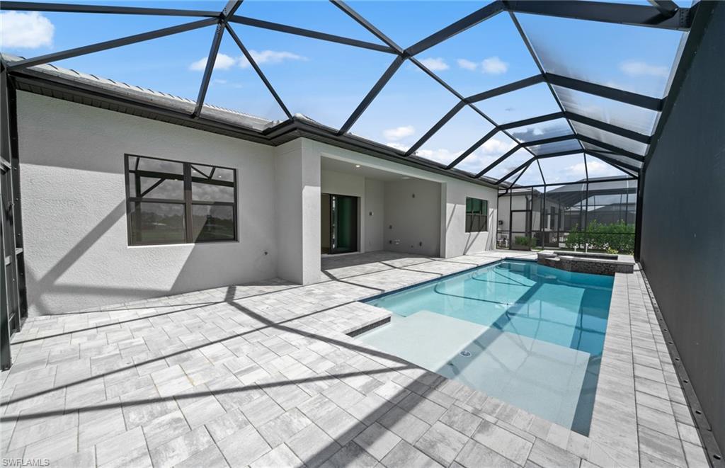 1992 Don Benito Way Naples, FL 34120 - Photo 4 of 49 Custom pool/spa with sunshelf