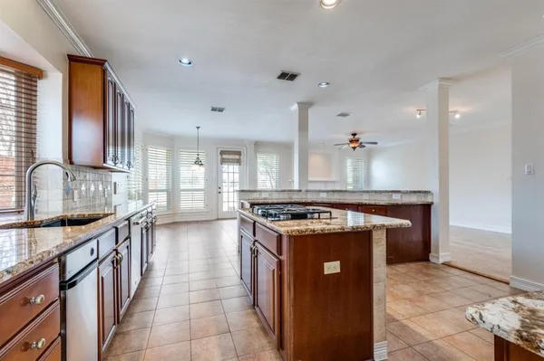 $915,500 | 702 East Peninsula Drive, Coppell, TX 75019
