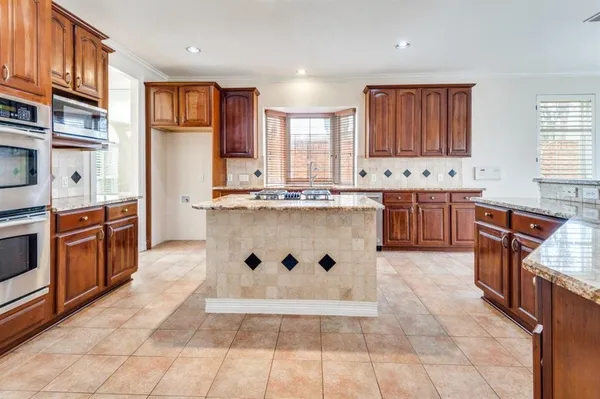 $915,500 | 702 East Peninsula Drive, Coppell, TX 75019