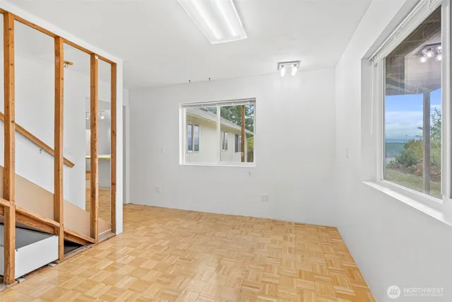 a view of a glass door and a window