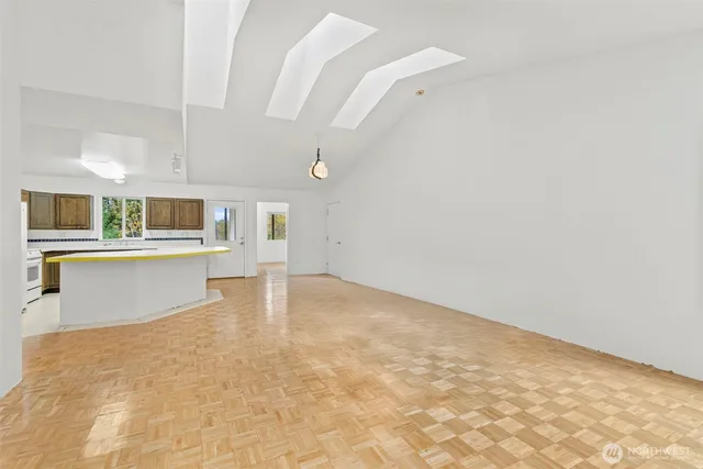 a view of kitchen with cabinets