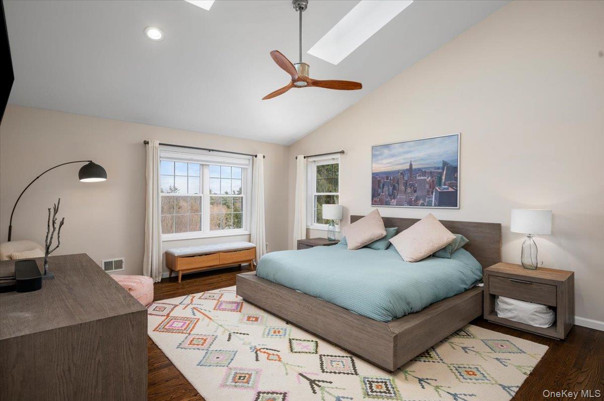 9 Drake Lane White Plains, NY 10607 - Photo 11 of 32 a bedroom with a bed and a table