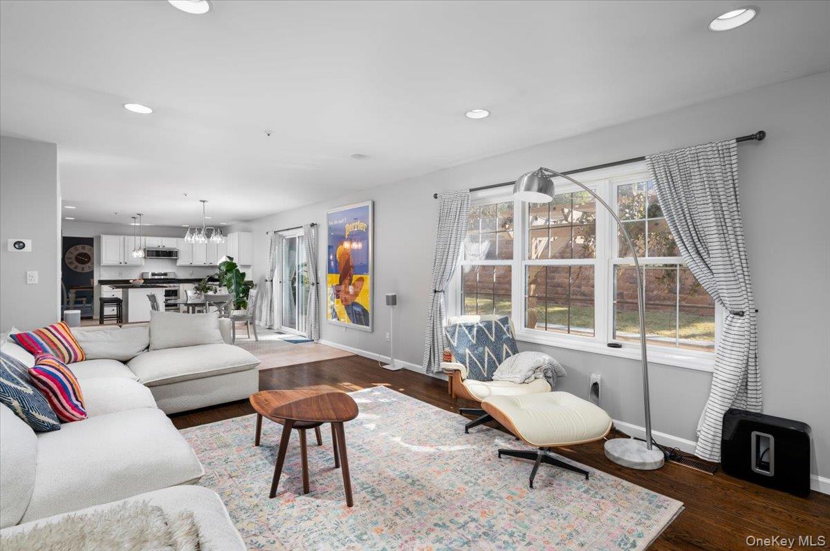 9 Drake Lane White Plains, NY 10607 - Photo 9 of 32 a living room with furniture and a large window