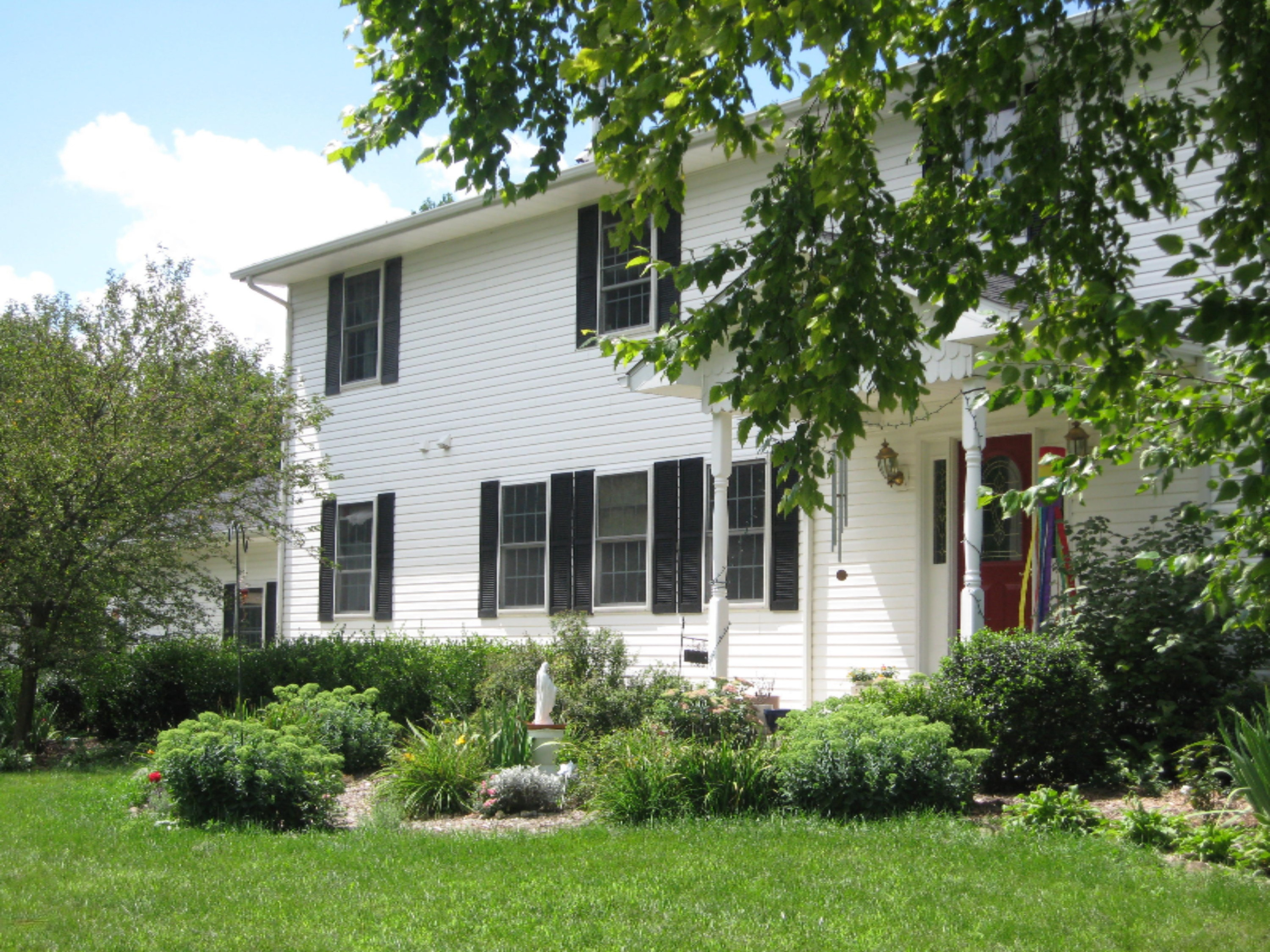 825 State Road Quincy, MI 49082 - Photo 1 of 16 house front.JPG