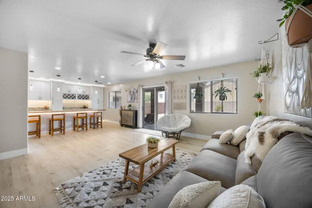 a dining table with chairs and wooden floor