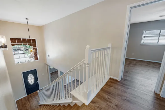 a bathroom with a sink a large mirror and vanity