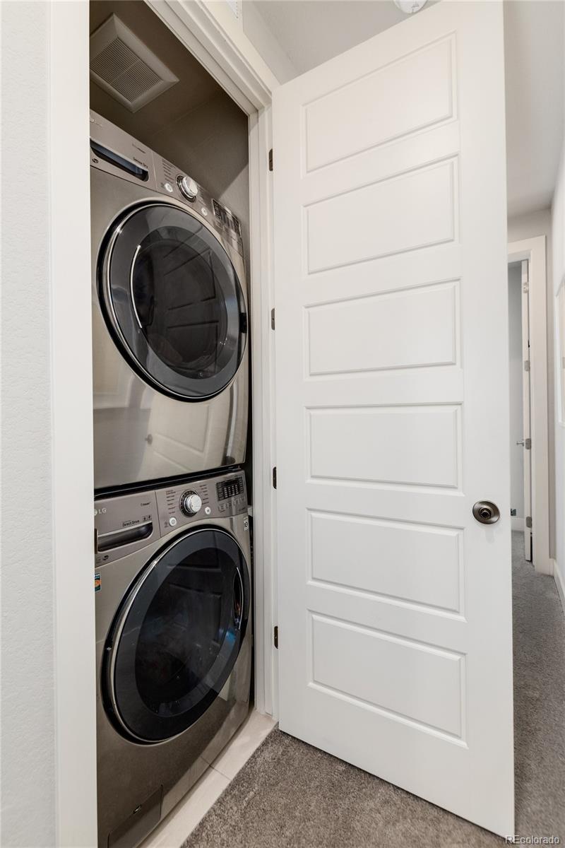 2436 North Washington Street Denver, CO 80205 - Photo 23 of 30 a utility room with dryer and washer