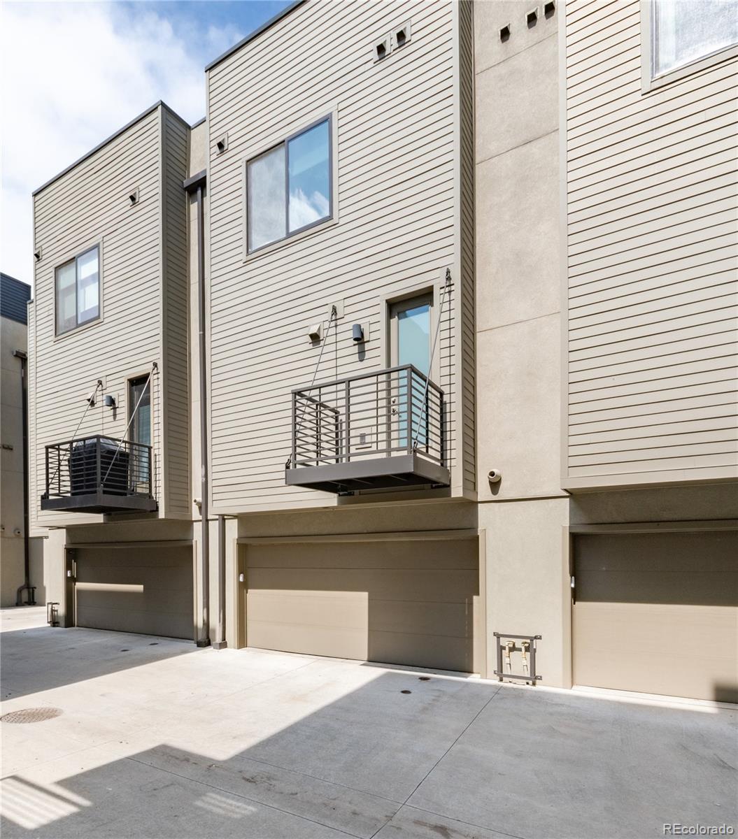 2436 North Washington Street Denver, CO 80205 - Photo 29 of 30 a view of living room kitchen and entryway