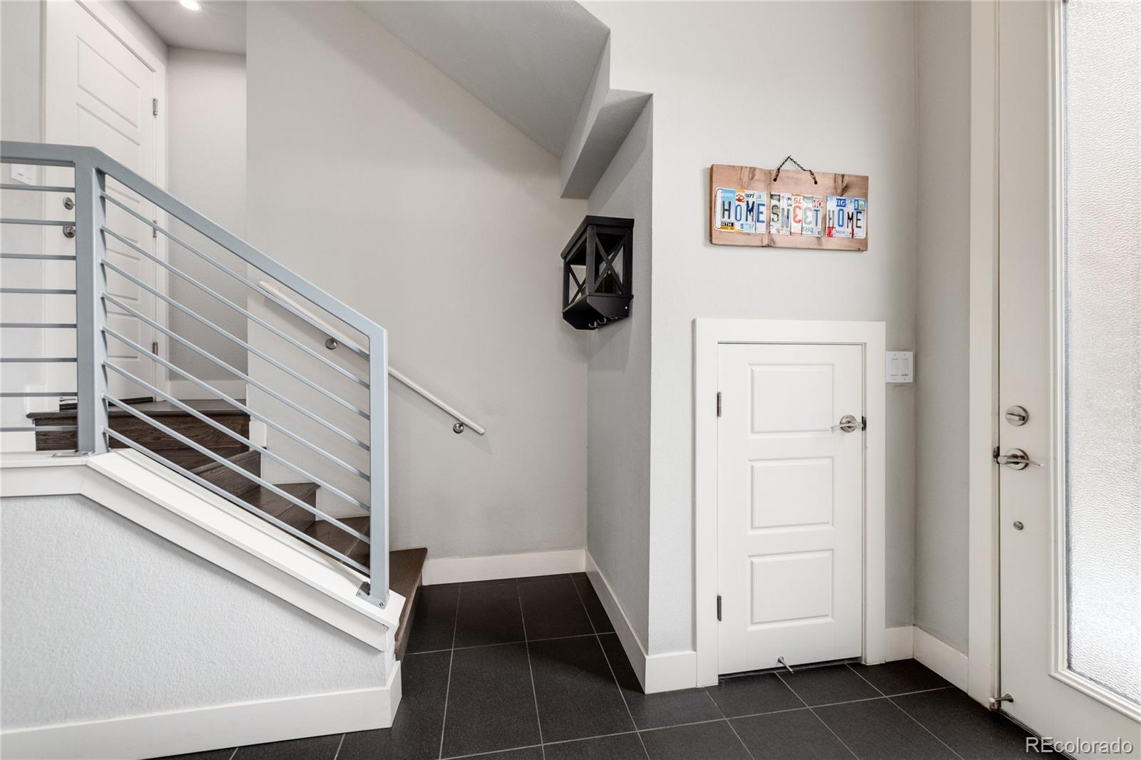 2436 North Washington Street Denver, CO 80205 - Photo 6 of 30 a view of an entryway with hallway