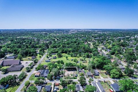 6217 Nuben Street Houston, TX 77091 - Photo 5 of 7 an aerial view of a city with lots of residential buildings