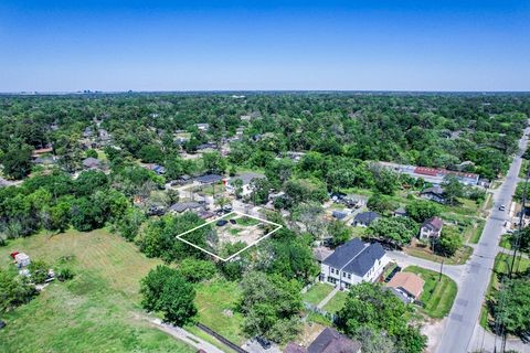 6217 Nuben Street Houston, TX 77091 - Photo 7 of 7 an aerial view of residential houses with outdoor space and trees
