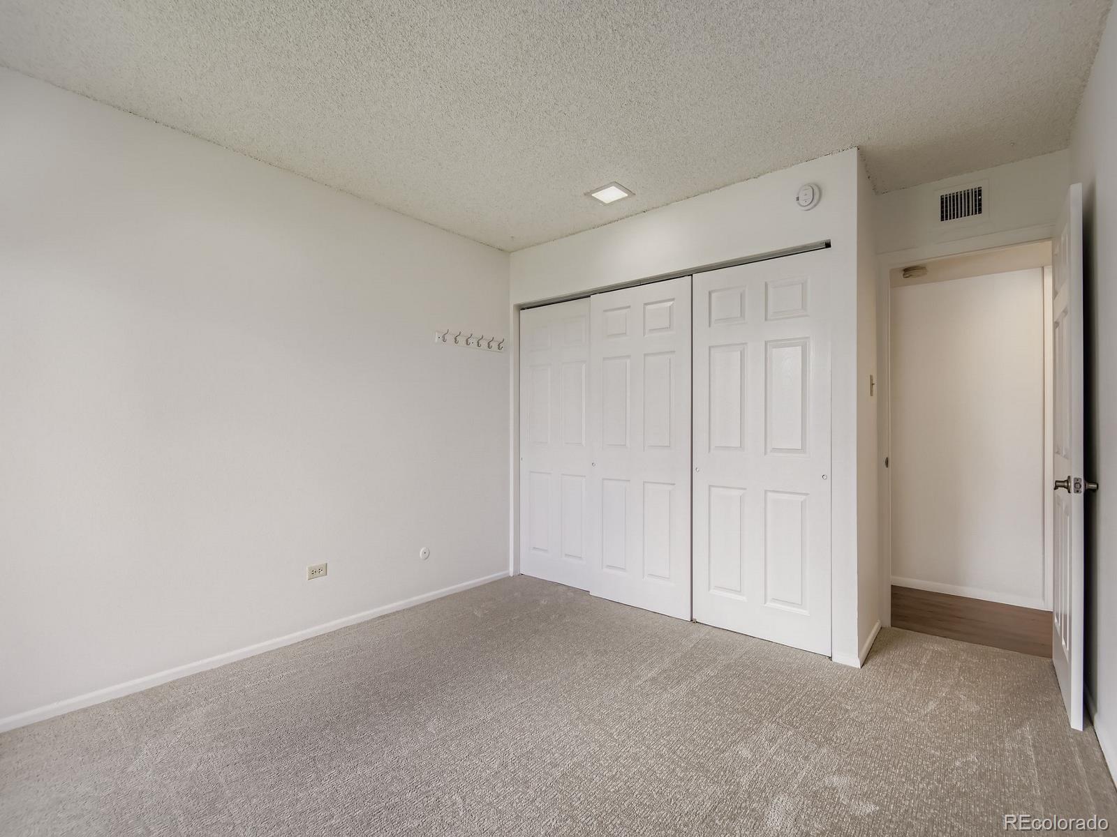 3323 South Monaco Street, Unit D Denver, CO 80222 - Photo 20 of 27 a view of an empty room