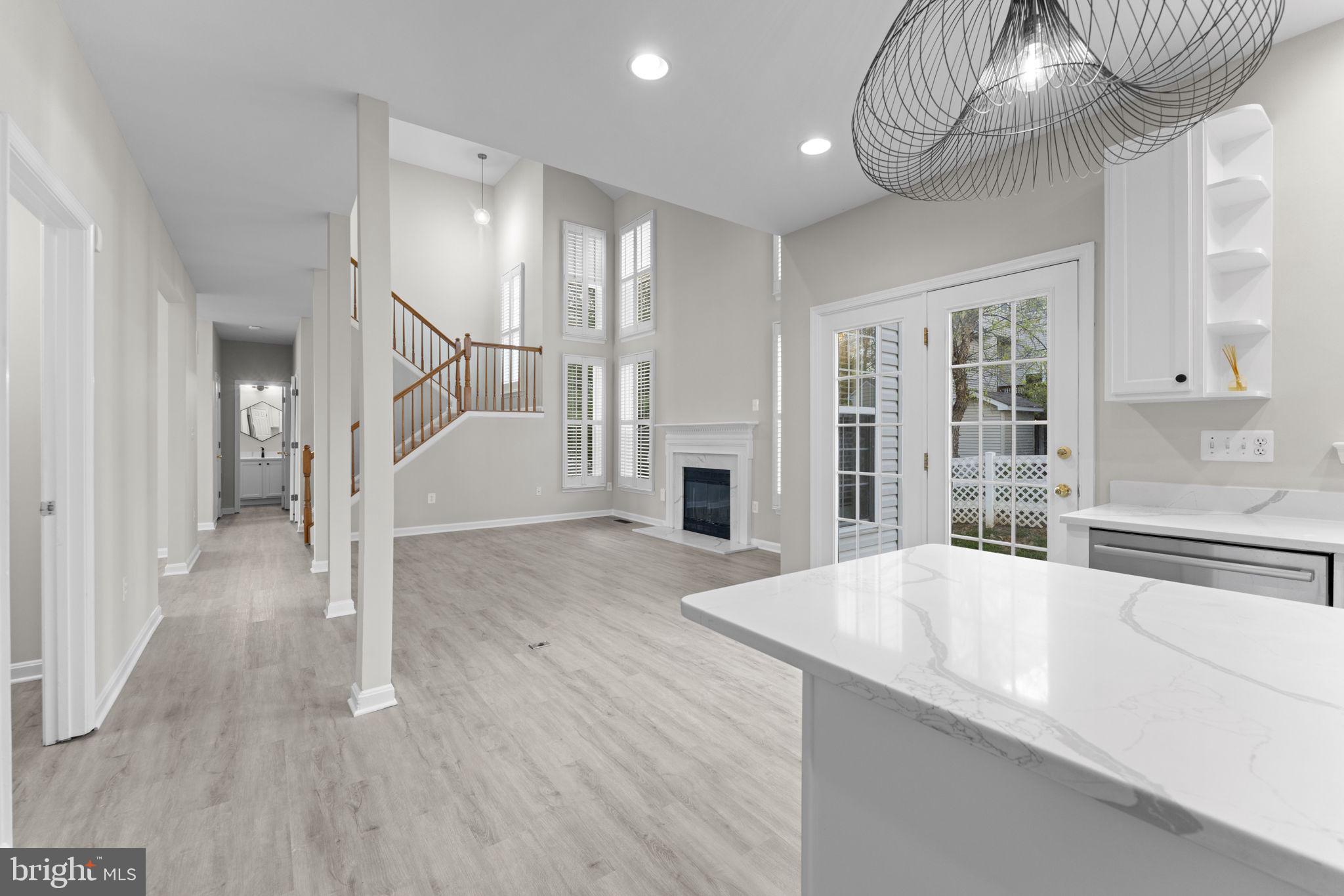 17549 Tedler Circle Round Hill, VA 20141 - Photo 16 of 71 a view of an entryway with wooden floor and door