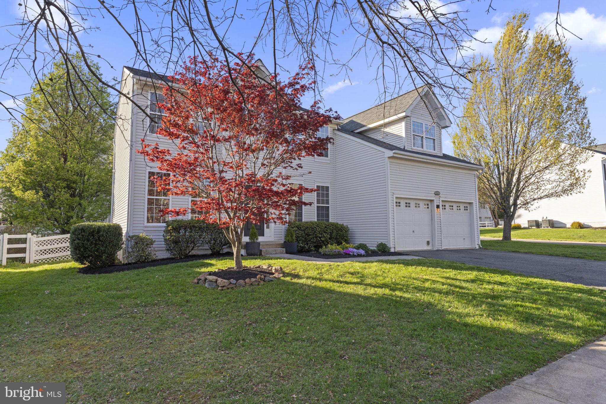 17549 Tedler Circle Round Hill, VA 20141 - Photo 2 of 71 a view of a house with a yard and tree s