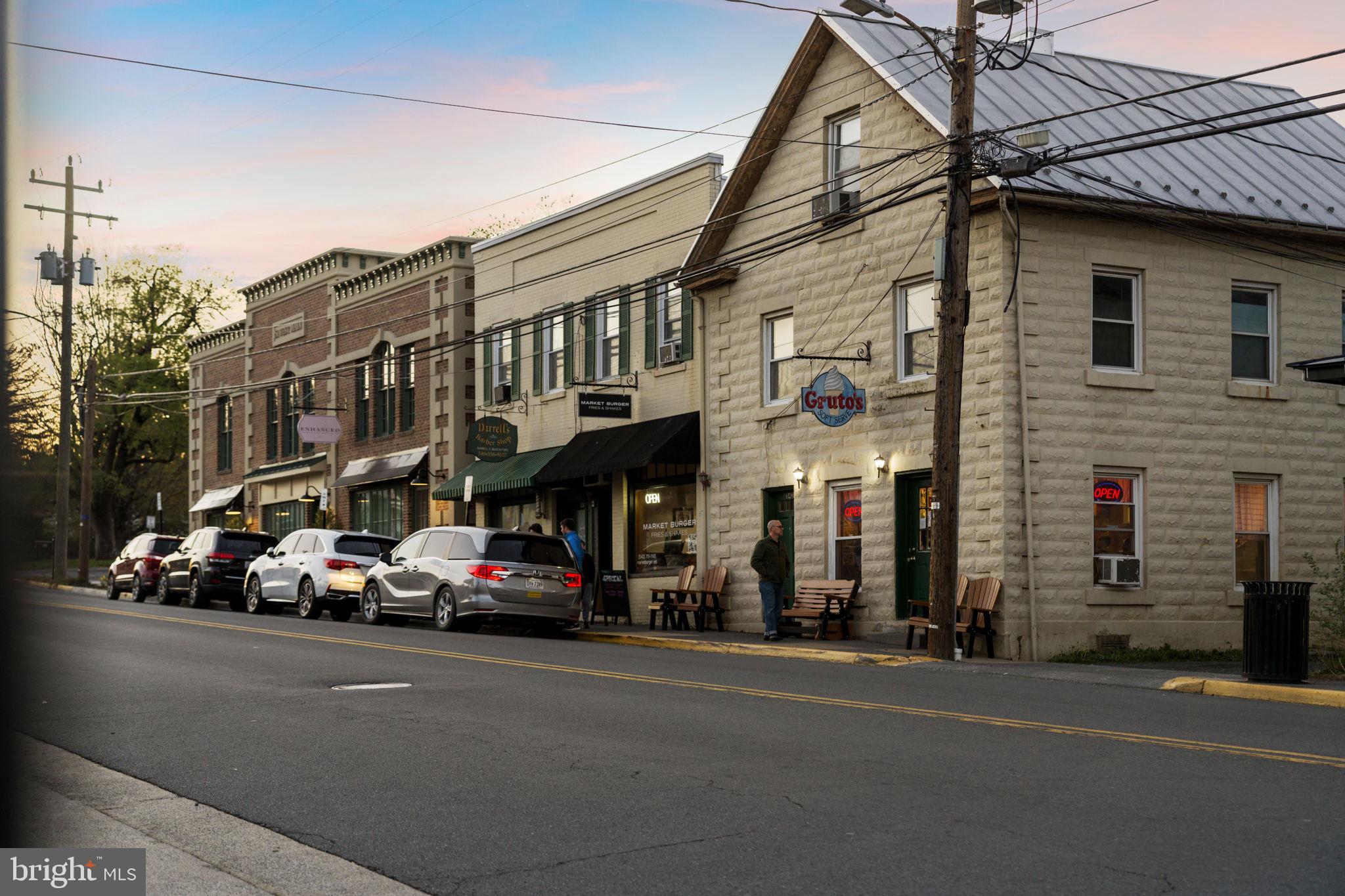 17549 Tedler Circle Round Hill, VA 20141 - Photo 65 of 71 a car parked in front of a building