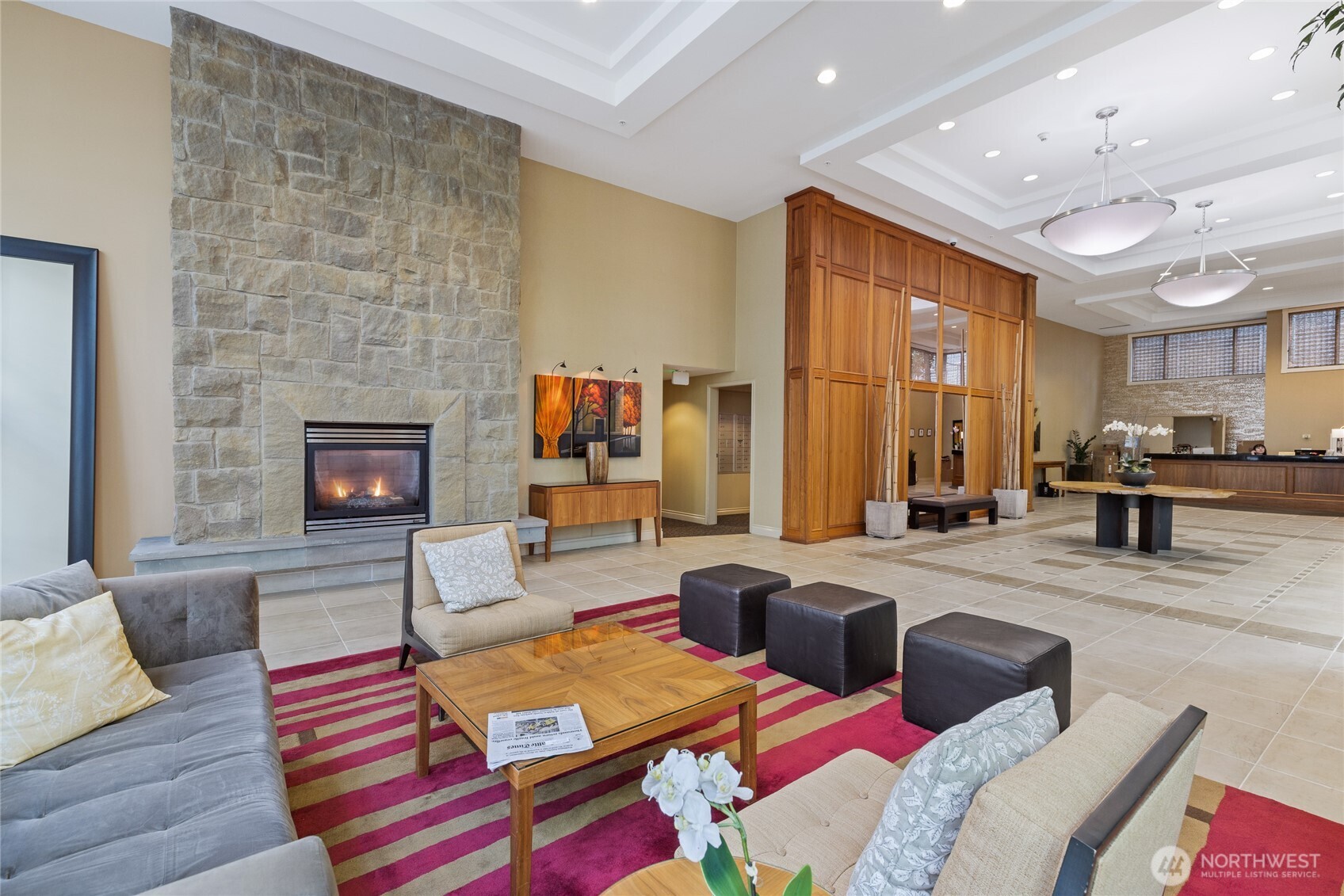 1420 Terry Avenue, Unit 607 Seattle, WA 98101 - Photo 23 of 40 a living room with furniture and a fireplace
