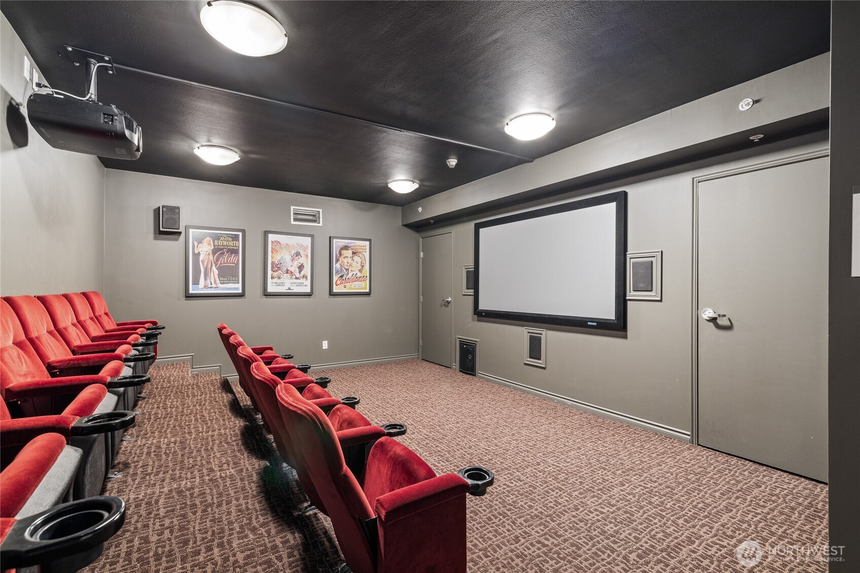 1420 Terry Avenue, Unit 607 Seattle, WA 98101 - Photo 27 of 40 a projector room with furniture