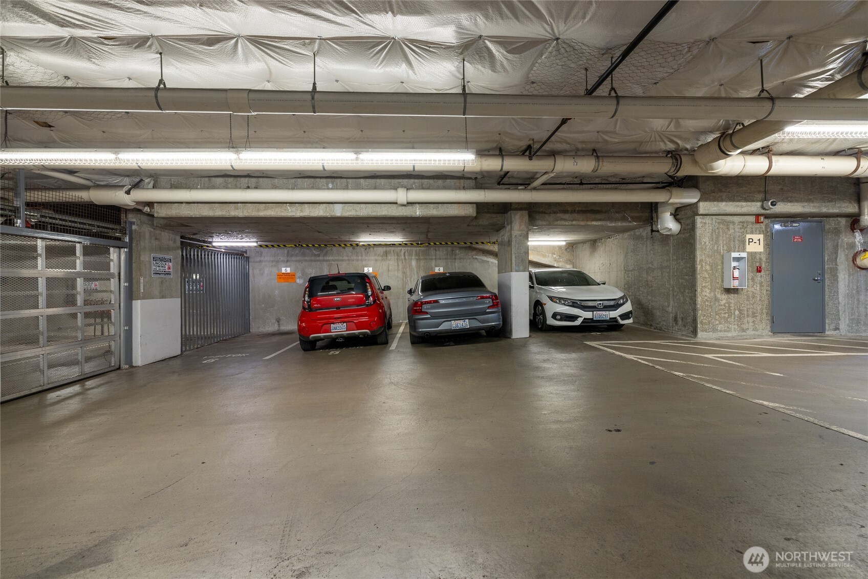 1420 Terry Avenue, Unit 607 Seattle, WA 98101 - Photo 37 of 40 a view of parking garage with cars