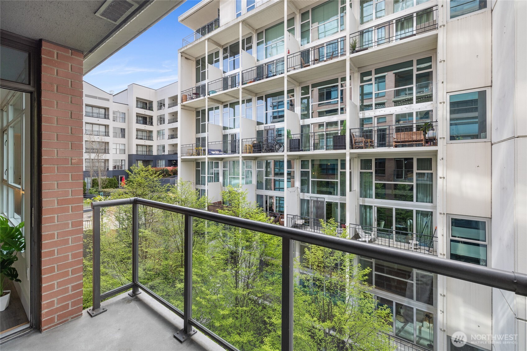 1420 Terry Avenue, Unit 607 Seattle, WA 98101 - Photo 9 of 40 a view of a building from a balcony