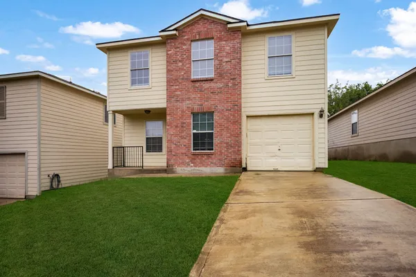 a front view of house with yard