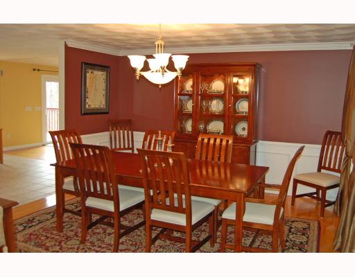 69 Olney Keach Road Glocester, RI 02814 - Photo 6 of 12 Dining Room. How does a dining room that actually could fit your whole family sound? Well then this one is for you! Complete with hardwood floors, chair rail, crown molding, and wainscoting! One look and youull never leave!