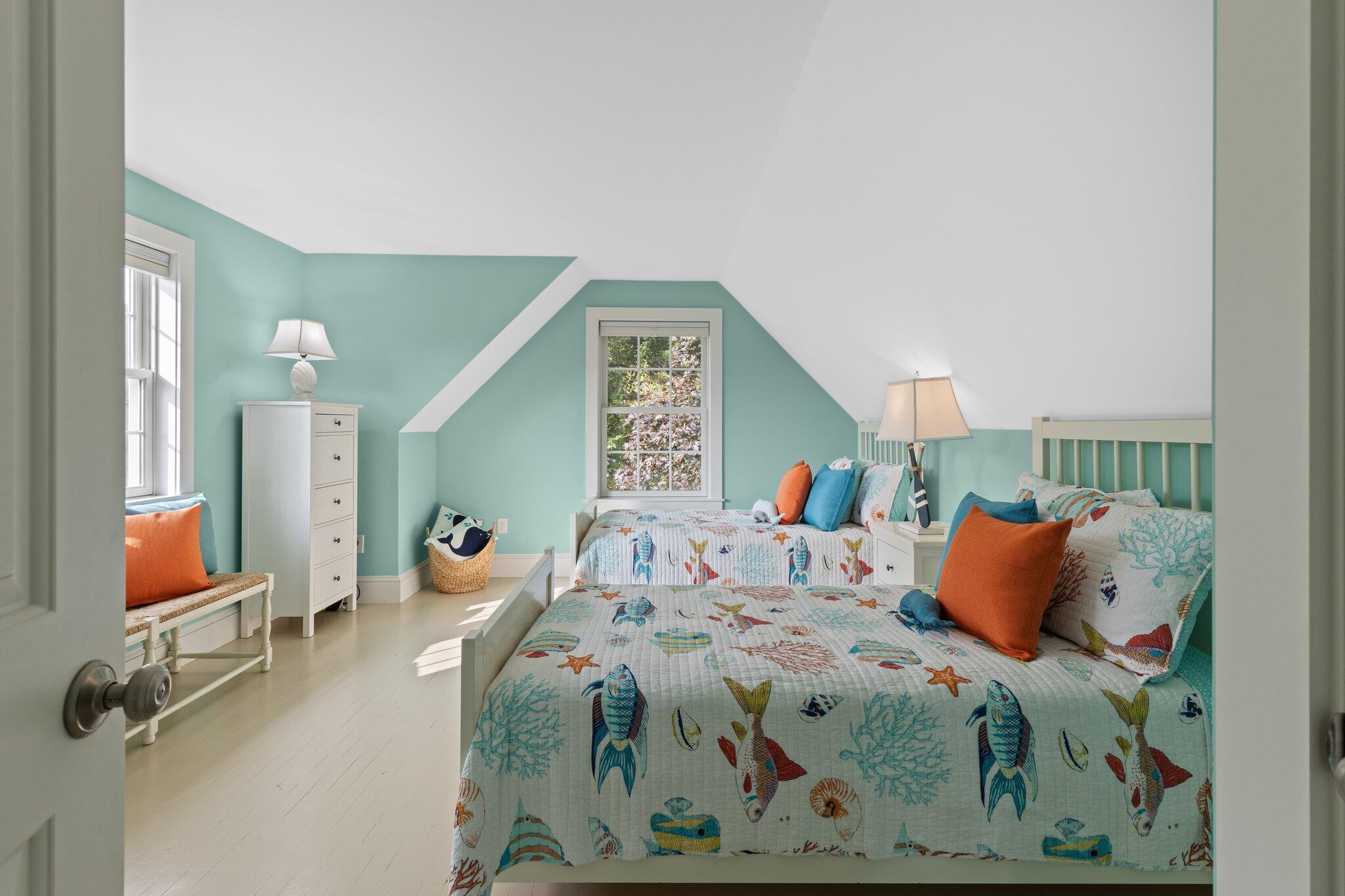 96 Pochet Road Orleans, MA 02653 - Photo 34 of 55 a bedroom with a bed and wooden floor