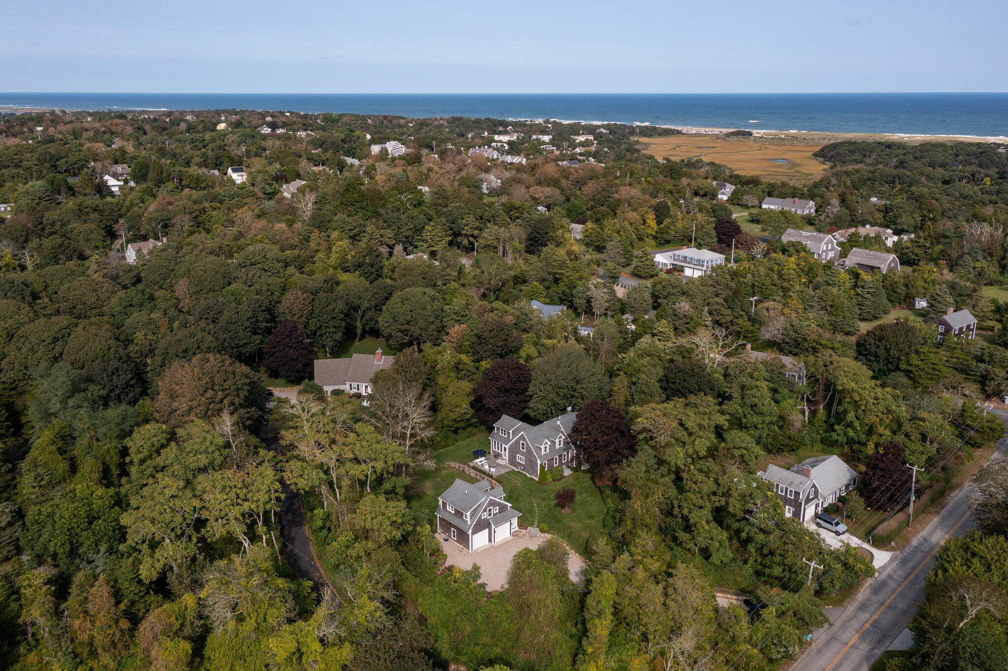 96 Pochet Road Orleans, MA 02653 - Photo 54 of 55 an aerial view of residential houses with outdoor space and trees