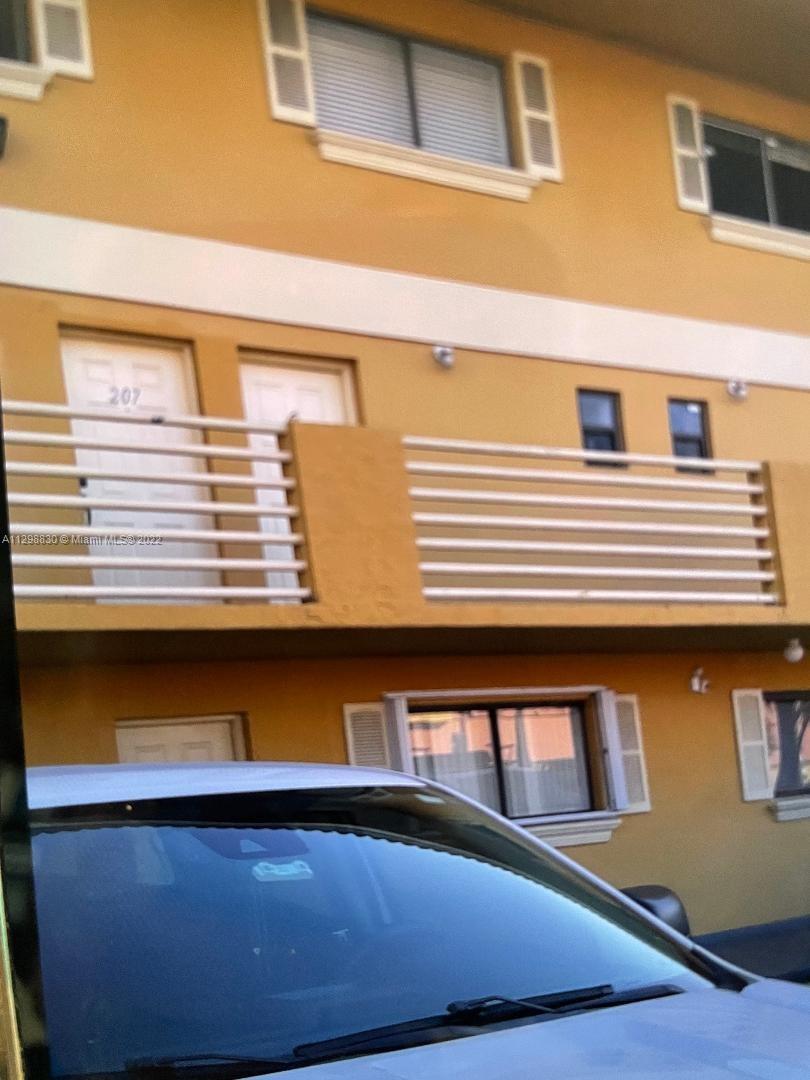 a view of a building from a balcony