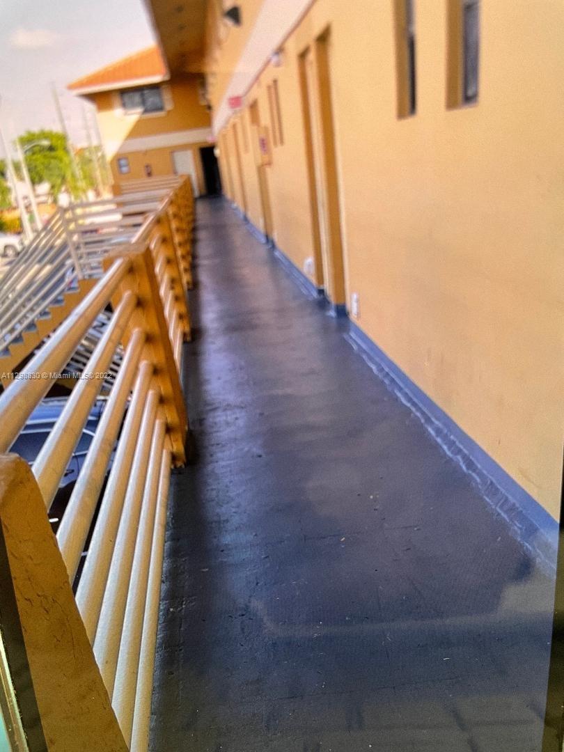 180 Royal Palm Road, Unit 219 Hialeah Gardens, FL 33016 - Photo 2 of 7 a view of wooden floor