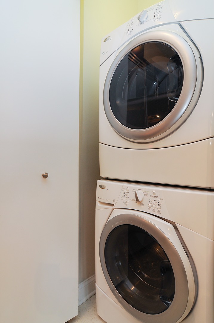 2 West Delaware Place, Unit 504 Chicago, IL 60610 - Photo 15 of 24 a close up view of washer and dryer